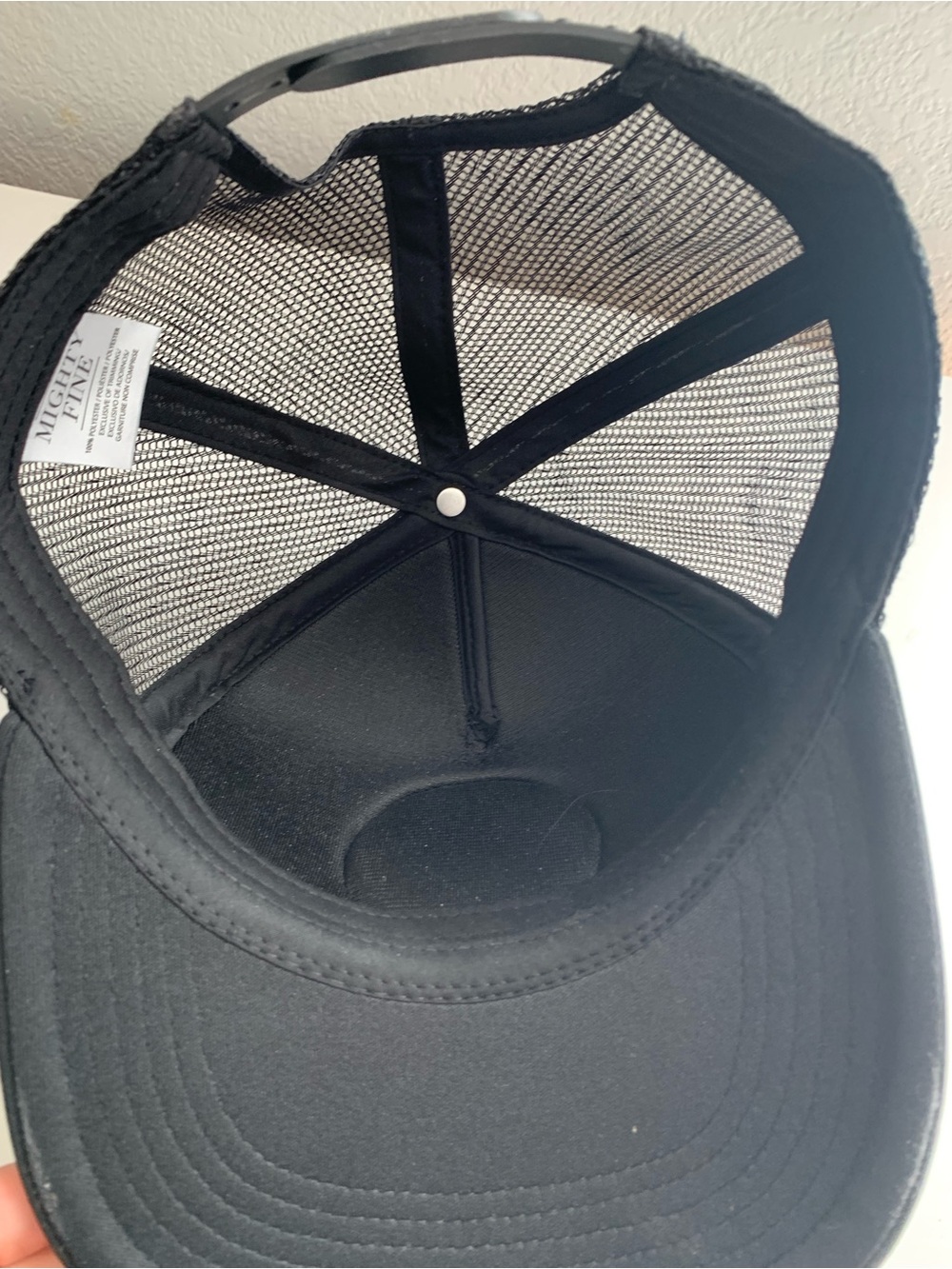 Black Trucker Hat with Yellow Fuzzy Smiley Face Patch with Heart-Eyes - Picture 5 of 6